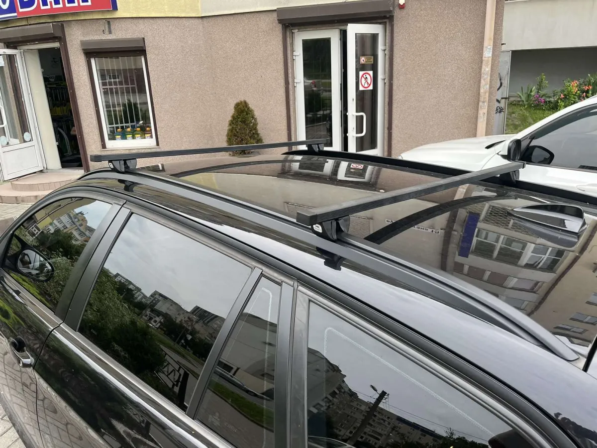 Багажник на рейлінги для BMW 3-seria (E90) Kombi 05-11 Amos Futura str 1.2