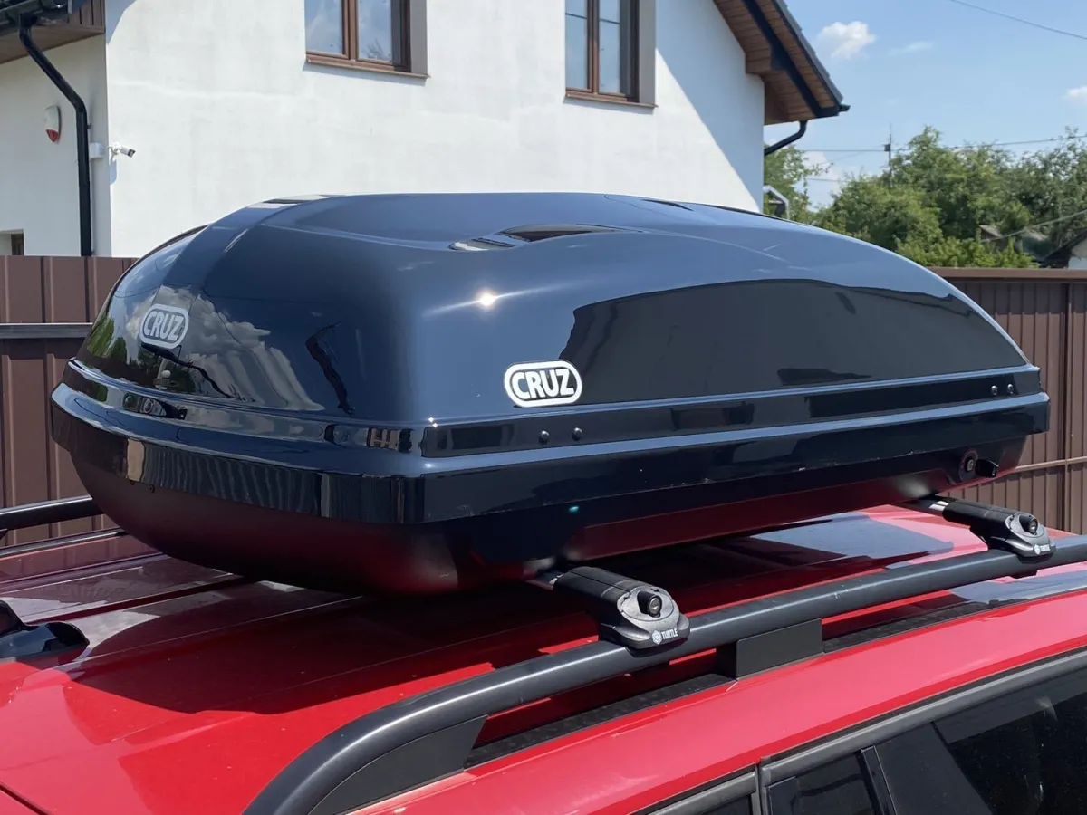 Автобокс на крышу автомобиля Cruz 340 140x80x45 черный глянец