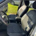Як виглядає Авто чохли для Honda Jazz 2008–2015 Pok-ter Motive екошкіра з тканиною чорного кольору в салоні (на прикладі SKODA OCTAVIA 2004-2013 A5) – фото 2.