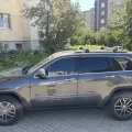 Фото 1: Багажник на рейлинги Turtle AIR 2 Jeep Grand Cherokee WK2 SUV 2011- Черный (MC02002-9498S) (на фото пример установки на JEEP GRAND CHEROKEE 2011-). Цвет: Черный.