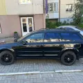 Фото 1:  (на фото пример установки на SUBARU OUTBACK 2003-2009). Цвет: Черный.