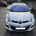Фото 1:  (на фото пример установки на MAZDA CX-7 2006-2012). Цвет: Серебряный.