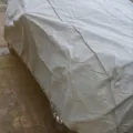 Фото 1: Чехол-тент для автомобиля Kegel для JEEP Patriot Basic Garage L SUV/Off Road (5-3968-241-3021) (на фото пример установки на RENAULT DUSTER). Цвет: Серый.