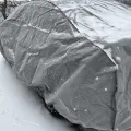 Як виглядає Чохол-тент для автомобіля Kegel для SKODA Octavia TOUR/A5/A7 liftback/sedan Basic Garage L Sedan (5-3963-241-3021) в салоні (на прикладі CHEVROLET AVEO) – фото 2.
