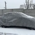 Встановлений товар Чохол-тент для автомобіля Kegel для SKODA Octavia TOUR/A5/A7 liftback/sedan Basic Garage L Sedan (5-3963-241-3021) (на фото авто CHEVROLET AVEO) – фото 3.