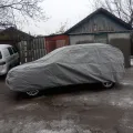 Фото 1: Чехол-тент для автомобиля Kegel для JEEP Patriot Basic Garage L SUV/Off Road (5-3968-241-3021) (на фото пример установки на VOLKSWAGEN TIGUAN). Цвет: Серый.