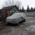 Как выглядит Чехол-тент для автомобиля Kegel для JEEP Patriot Basic Garage L SUV/Off Road (5-3968-241-3021) в салоне (на примере VOLKSWAGEN TIGUAN) – фото 2.