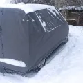 Фото 1: Чехол-тент для автомобиля RENAULT Kangoo (I) Kegel-Blazusiak Mobile Garage M LAV (5-4135-248-3020) (на фото пример установки на PEUGEOT PARTNER). Цвет: Серый.