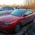 Фото 1:  (на фото пример установки на MAZDA 3 2003-2009). Цвет: Черный.