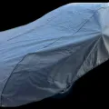Как выглядит Чехол-тент для автомобиля Kegel для TOYOTA Avensis kombi Basic Garage XL Hatchback/Combi (5-3957-241-3021) в салоне (на примере RENAULT LAGUNA) – фото 2.