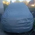 Фото 1: Чохол-тент для автомобіля LADA VESTA SW CROSS Autovalom L SUV (CC2504) (на фото приклад встановлення на SUBARU FORESTER). Колір: Сірий.