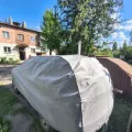 Встановлений товар Чохол-тент для автомобіля Kegel для DACIA Duster Basic Garage L SUV/Off Road (5-3968-241-3021) (на фото авто SSANGYONG ACTYON) – фото 3.