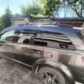 Фото 1: Багажник на рейлінги Turtle AIR 1 Dacia Logan MCV 2007-2012 Чорний (на фото приклад встановлення на DODGE JOURNEY 2008-2020). Колір: Чорний.