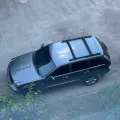 Фото 1:  (на фото пример установки на JEEP GRAND CHEROKEE 2004-2010). Цвет: Черный.