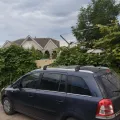 Фото 1: Багажник на рейлинги Turtle AIR 2 Audi A6 2011+ Серебристый (на фото пример установки на OPEL ZAFIRA 2005-2011 (B)). Цвет: Черный.