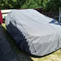 Фото 1: Чохол-тент для автомобіля Kegel для AUDI A4 B5/B6/B7/B8/B9 універсал Mobile Garage XL Hatchback/Combi (5-4104-248-3020)  (на фото приклад встановлення на RENAULT MEGANE). Колір: Сірий.