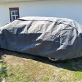Як виглядає Чохол-тент для автомобіля Kegel для AUDI A4 B5/B6/B7/B8/B9 універсал Mobile Garage XL Hatchback/Combi (5-4104-248-3020)  в салоні (на прикладі RENAULT MEGANE) – фото 2.