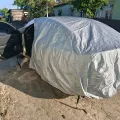 Фото 1: Чехол-тент для автомобиля KIA Spectra Autovalom L Sedan (CC2502) (на фото пример установки на MAZDA 3). Цвет: Серый.