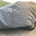 Фото 1: Чехол-тент для автомобиля SUZUKI S-CROSS Kegel-Blazusiak Mobile Garage L SUV/Off Road (5-4122-248-3020) (на фото пример установки на KIA SPORTAGE). Цвет: Серый.