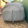 Как выглядит Чехол-тент для автомобиля SUZUKI S-CROSS Kegel-Blazusiak Mobile Garage L SUV/Off Road (5-4122-248-3020) в салоне (на примере KIA SPORTAGE) – фото 2.