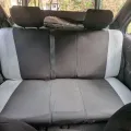 Фото 1: Авто чехлы для Dacia Sandero Stepway 2012-2020 AUAU eX-Line с серой вставкой (на фото пример установки на PEUGEOT 306 (1993-2001)). Цвет: Серая вставка, черные бока.