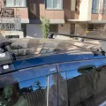 Установленный товар Багажник на гладкую крышу для FORD Kuga SUV 2013>2017 Amos Dramader str Plus D1, 1.3 (на фото авто NISSAN LEAF 2017-2025) – фото 3.