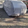 Фото 1: Чохол-тент для автомобіля Kegel для FORD Focus I hatchback/kombi Basic Garage L1 Hatchback/Combi (5-3956-241-3021) (на фото приклад встановлення на SKODA FABIA). Колір: Сірий.