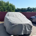 Как выглядит Чехол-тент для автомобиля SEAT Tarraco Kegel-Blazusiak Mobile Garage XL SUV/Off Road (5-4123-248-3020) в салоне (на примере BMW X5) – фото 2.