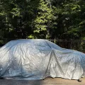 Фото 1: Чехол-тент для автомобиля JAGUAR E-Pace Autovalom L SUV (CC2504) (на фото пример установки на NISSAN JUKE). Цвет: Серый.