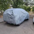 Фото 1: Чехол-тент для автомобиля JAGUAR E-Pace Autovalom L SUV (CC2504) (на фото пример установки на RENAULT DUSTER). Цвет: Серый.